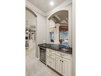 Situated on 1.85 acres along the Kinderlou Forest golf course on Kinderlou Forest Golf Club in Georgia - for sale on GolfHomes.com, golf home, golf lot