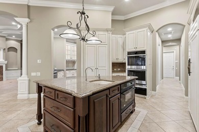 Situated on 1.85 acres along the Kinderlou Forest golf course on Kinderlou Forest Golf Club in Georgia - for sale on GolfHomes.com, golf home, golf lot