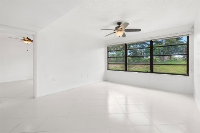 Motivated Seller! Discover refined living in this spacious on The Country Club At Boca Raton in Florida - for sale on GolfHomes.com, golf home, golf lot