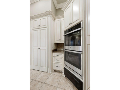 Situated on 1.85 acres along the Kinderlou Forest golf course on Kinderlou Forest Golf Club in Georgia - for sale on GolfHomes.com, golf home, golf lot