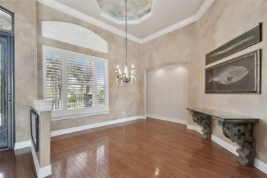 This magnificent four bedroom, three bath pool home is located on Pasadena Yacht and Country Club in Florida - for sale on GolfHomes.com, golf home, golf lot