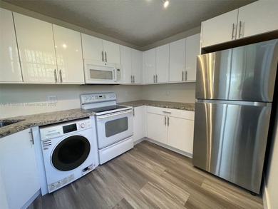 A FULLY REMODELED UNIT, IT IS BRIGHT AND HAS GREAT VIEWS on Jacaranda Golf Club in Florida - for sale on GolfHomes.com, golf home, golf lot