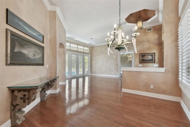 This magnificent four bedroom, three bath pool home is located on Pasadena Yacht and Country Club in Florida - for sale on GolfHomes.com, golf home, golf lot