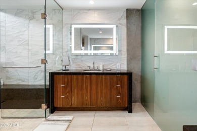 Discover refined living in this rare 2-bedroom, 2.5-bathroom on Mountain Shadows Executive Golf Course in Arizona - for sale on GolfHomes.com, golf home, golf lot