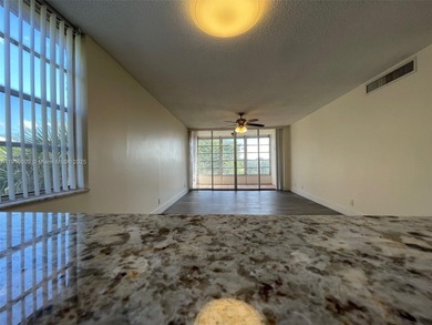A FULLY REMODELED UNIT, IT IS BRIGHT AND HAS GREAT VIEWS on Jacaranda Golf Club in Florida - for sale on GolfHomes.com, golf home, golf lot