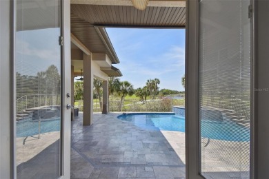 This magnificent four bedroom, three bath pool home is located on Pasadena Yacht and Country Club in Florida - for sale on GolfHomes.com, golf home, golf lot