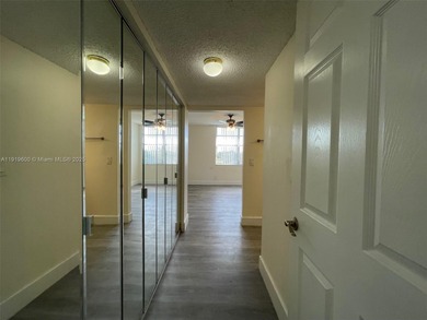 A FULLY REMODELED UNIT, IT IS BRIGHT AND HAS GREAT VIEWS on Jacaranda Golf Club in Florida - for sale on GolfHomes.com, golf home, golf lot