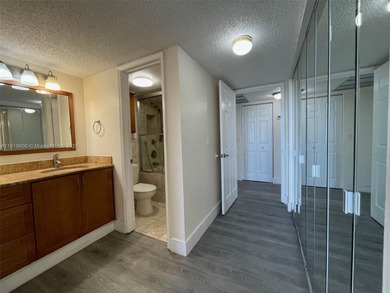 A FULLY REMODELED UNIT, IT IS BRIGHT AND HAS GREAT VIEWS on Jacaranda Golf Club in Florida - for sale on GolfHomes.com, golf home, golf lot