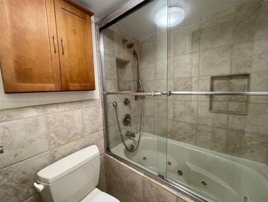 A FULLY REMODELED UNIT, IT IS BRIGHT AND HAS GREAT VIEWS on Jacaranda Golf Club in Florida - for sale on GolfHomes.com, golf home, golf lot