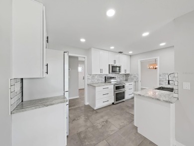 Welcome to The Lakes, a HIGHLY desirable 55+ community that has on Mainlands Golf Club in Florida - for sale on GolfHomes.com, golf home, golf lot