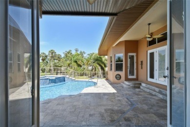 This magnificent four bedroom, three bath pool home is located on Pasadena Yacht and Country Club in Florida - for sale on GolfHomes.com, golf home, golf lot
