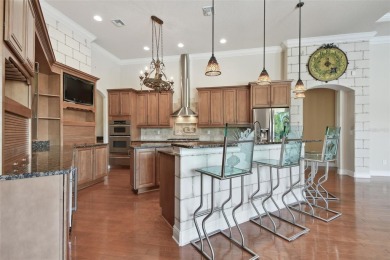This magnificent four bedroom, three bath pool home is located on Pasadena Yacht and Country Club in Florida - for sale on GolfHomes.com, golf home, golf lot