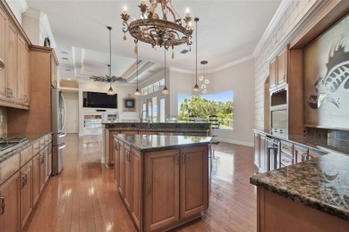 This magnificent four bedroom, three bath pool home is located on Pasadena Yacht and Country Club in Florida - for sale on GolfHomes.com, golf home, golf lot