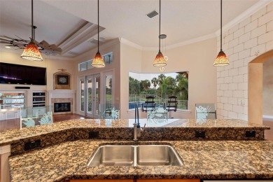 This magnificent four bedroom, three bath pool home is located on Pasadena Yacht and Country Club in Florida - for sale on GolfHomes.com, golf home, golf lot