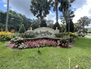 A FULLY REMODELED UNIT, IT IS BRIGHT AND HAS GREAT VIEWS on Jacaranda Golf Club in Florida - for sale on GolfHomes.com, golf home, golf lot