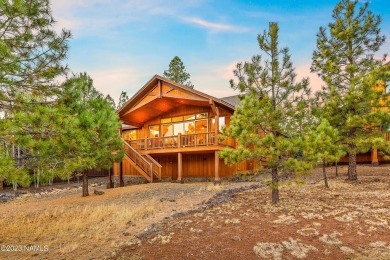 Nestled amid the expansive views of two fairways, a creek with a on Flagstaff Ranch Golf Club in Arizona - for sale on GolfHomes.com, golf home, golf lot