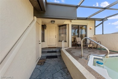 Welcome home to this canal front, one level condo in highly on Saint Andrews South Golf Club in Florida - for sale on GolfHomes.com, golf home, golf lot