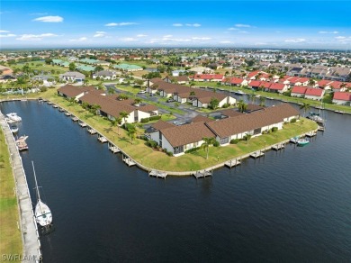 Welcome home to this canal front, one level condo in highly on Saint Andrews South Golf Club in Florida - for sale on GolfHomes.com, golf home, golf lot