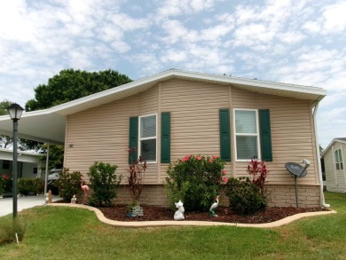 This lakefront beauty is loving maintained and super clean. With on Tomoka Oaks Golf and Country Club in Florida - for sale on GolfHomes.com, golf home, golf lot