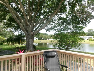 This lakefront beauty is loving maintained and super clean. With on Tomoka Oaks Golf and Country Club in Florida - for sale on GolfHomes.com, golf home, golf lot