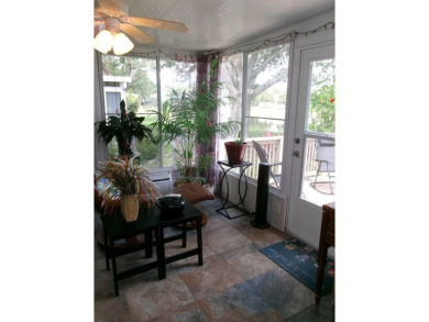 This lakefront beauty is loving maintained and super clean. With on Tomoka Oaks Golf and Country Club in Florida - for sale on GolfHomes.com, golf home, golf lot