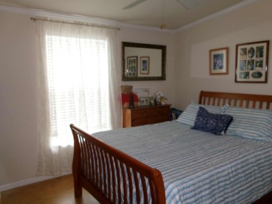 This lakefront beauty is loving maintained and super clean. With on Tomoka Oaks Golf and Country Club in Florida - for sale on GolfHomes.com, golf home, golf lot
