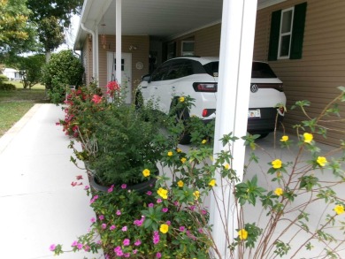 This lakefront beauty is loving maintained and super clean. With on Tomoka Oaks Golf and Country Club in Florida - for sale on GolfHomes.com, golf home, golf lot