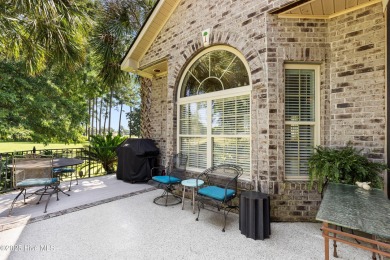 Magnificent all-brick custom home, located on a cul-de-sac on Sea Trail Golf Resort in North Carolina - for sale on GolfHomes.com, golf home, golf lot