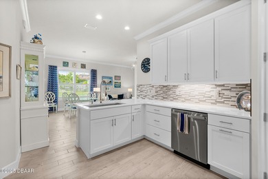 Welcome to this stunning 2-bedroom, 2-bathroom villa with a on Plantation Bay Golf and Country Club in Florida - for sale on GolfHomes.com, golf home, golf lot