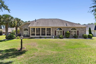 Magnificent all-brick custom home, located on a cul-de-sac on Sea Trail Golf Resort in North Carolina - for sale on GolfHomes.com, golf home, golf lot