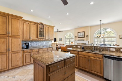 Magnificent all-brick custom home, located on a cul-de-sac on Sea Trail Golf Resort in North Carolina - for sale on GolfHomes.com, golf home, golf lot