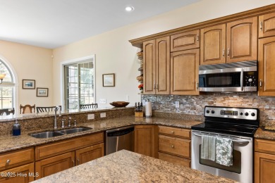 Magnificent all-brick custom home, located on a cul-de-sac on Sea Trail Golf Resort in North Carolina - for sale on GolfHomes.com, golf home, golf lot