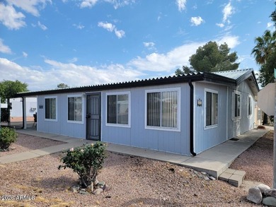 A beautiful 3 bedroom 2 bath home ., with Arizona room (not on 3 Parks Fairways in Arizona - for sale on GolfHomes.com, golf home, golf lot