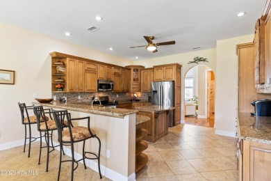 Magnificent all-brick custom home, located on a cul-de-sac on Sea Trail Golf Resort in North Carolina - for sale on GolfHomes.com, golf home, golf lot