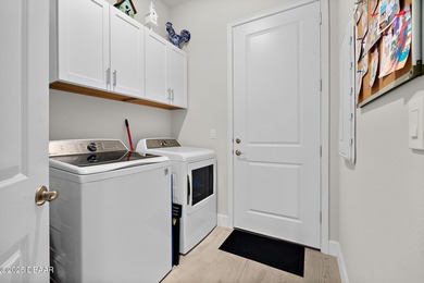 Welcome to this stunning 2-bedroom, 2-bathroom villa with a on Plantation Bay Golf and Country Club in Florida - for sale on GolfHomes.com, golf home, golf lot