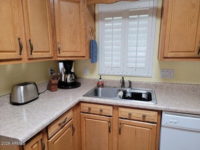 A beautiful 3 bedroom 2 bath home ., with Arizona room (not on 3 Parks Fairways in Arizona - for sale on GolfHomes.com, golf home, golf lot