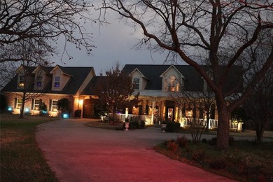 Custom 1.27 acre estate with soaring ceilings, sunroom fireplace on Nutcracker Golf Club in Texas - for sale on GolfHomes.com, golf home, golf lot