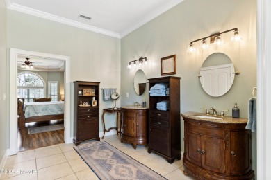 Magnificent all-brick custom home, located on a cul-de-sac on Sea Trail Golf Resort in North Carolina - for sale on GolfHomes.com, golf home, golf lot