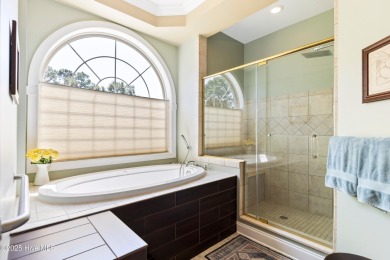 Magnificent all-brick custom home, located on a cul-de-sac on Sea Trail Golf Resort in North Carolina - for sale on GolfHomes.com, golf home, golf lot