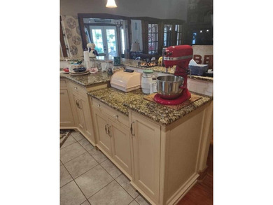 Custom 1.27 acre estate with soaring ceilings, sunroom fireplace on Nutcracker Golf Club in Texas - for sale on GolfHomes.com, golf home, golf lot