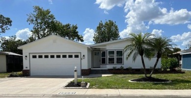 This beautifully renovated 3BED/2BATH open-concept home blends on Del Tura Golf and Country Club in Florida - for sale on GolfHomes.com, golf home, golf lot