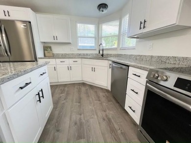 This beautifully renovated 3BED/2BATH open-concept home blends on Del Tura Golf and Country Club in Florida - for sale on GolfHomes.com, golf home, golf lot