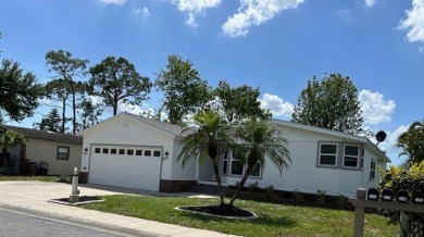 This beautifully renovated 3BED/2BATH open-concept home blends on Del Tura Golf and Country Club in Florida - for sale on GolfHomes.com, golf home, golf lot