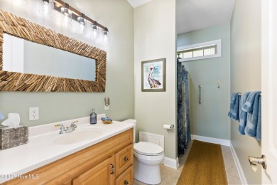 Magnificent all-brick custom home, located on a cul-de-sac on Sea Trail Golf Resort in North Carolina - for sale on GolfHomes.com, golf home, golf lot