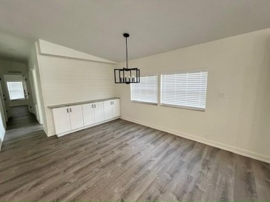 This beautifully renovated 3BED/2BATH open-concept home blends on Del Tura Golf and Country Club in Florida - for sale on GolfHomes.com, golf home, golf lot
