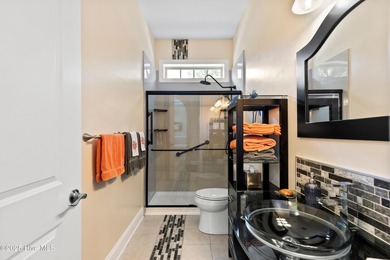 Magnificent all-brick custom home, located on a cul-de-sac on Sea Trail Golf Resort in North Carolina - for sale on GolfHomes.com, golf home, golf lot