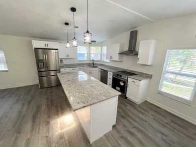 This beautifully renovated 3BED/2BATH open-concept home blends on Del Tura Golf and Country Club in Florida - for sale on GolfHomes.com, golf home, golf lot