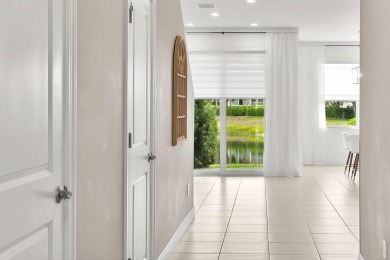 OPEN HOUSE 7/26 2pm-4pm. Waterfront Gem in Gated Toll Brothers on Hillsboro Pines Golf in Florida - for sale on GolfHomes.com, golf home, golf lot