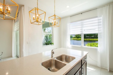 OPEN HOUSE 7/26 2pm-4pm. Waterfront Gem in Gated Toll Brothers on Hillsboro Pines Golf in Florida - for sale on GolfHomes.com, golf home, golf lot