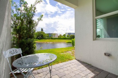OPEN HOUSE 7/26 2pm-4pm. Waterfront Gem in Gated Toll Brothers on Hillsboro Pines Golf in Florida - for sale on GolfHomes.com, golf home, golf lot